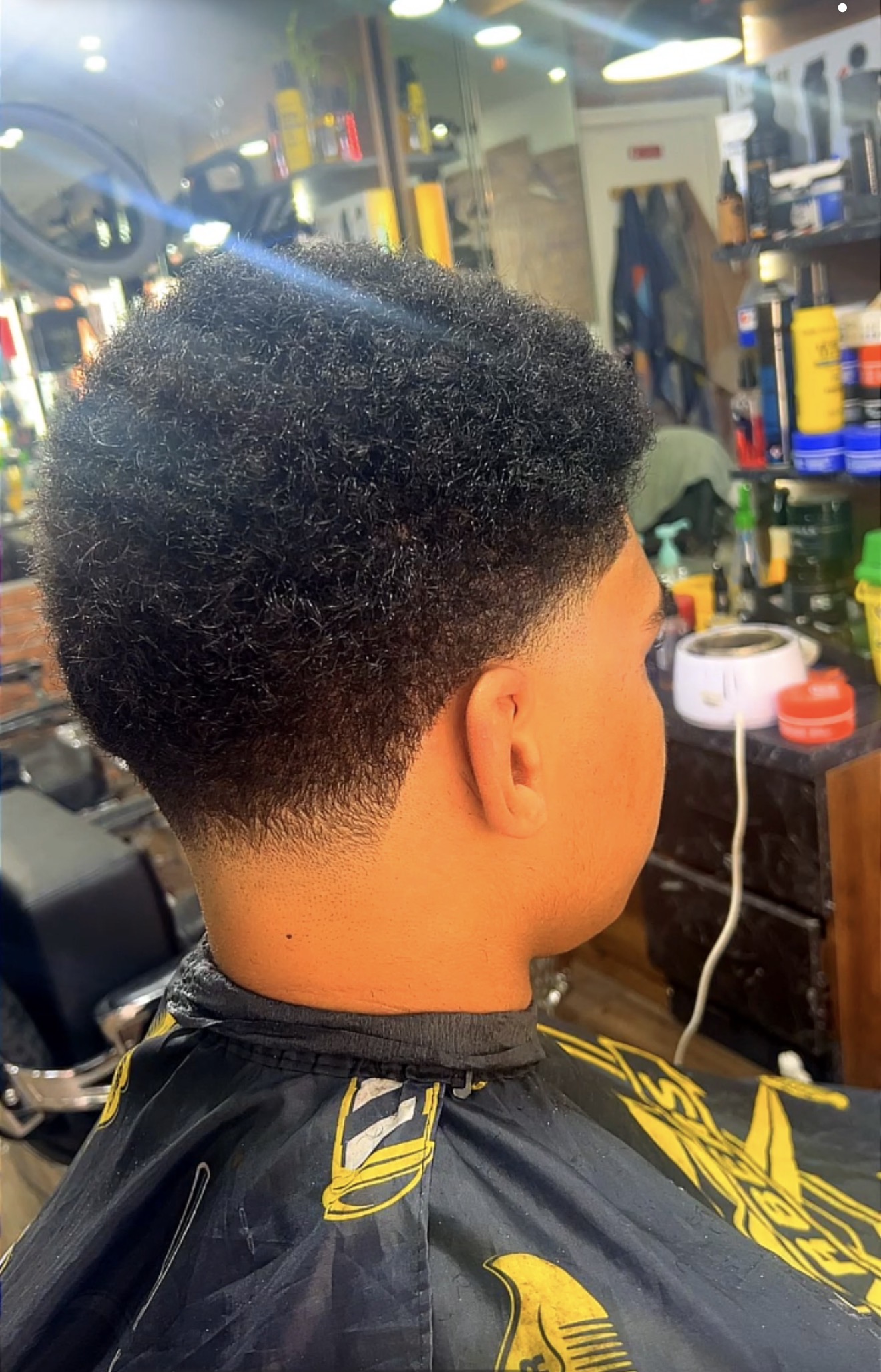 Réalisation coupe et style au salon Haircut Lille 1